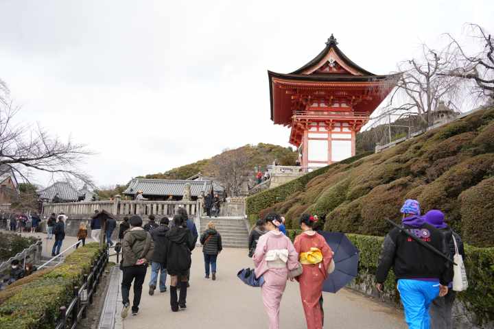 a group of people standing outside of a building