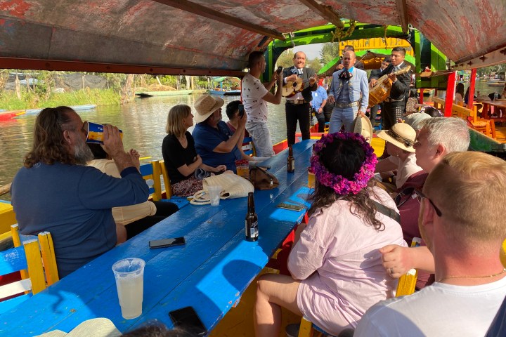 a group of people sitting around a table