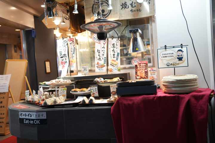 a stack of flyers on a table