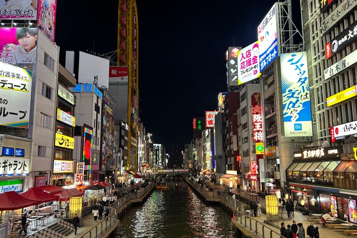 a city street filled with lots of traffic
