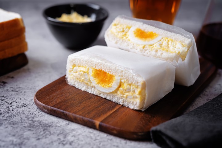 a piece of cake sitting on top of a wooden table