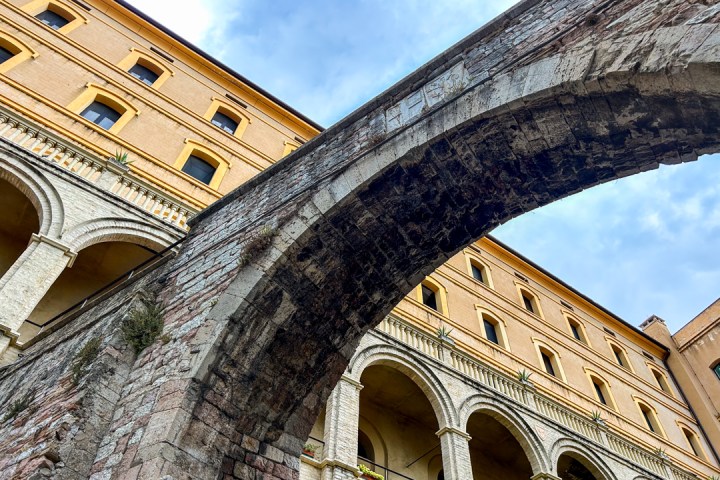 a large stone building with a clock tower