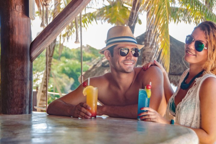 a woman sitting on a table