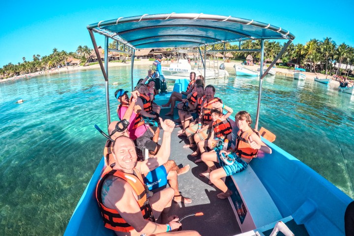 a group of people sitting in a pool of water