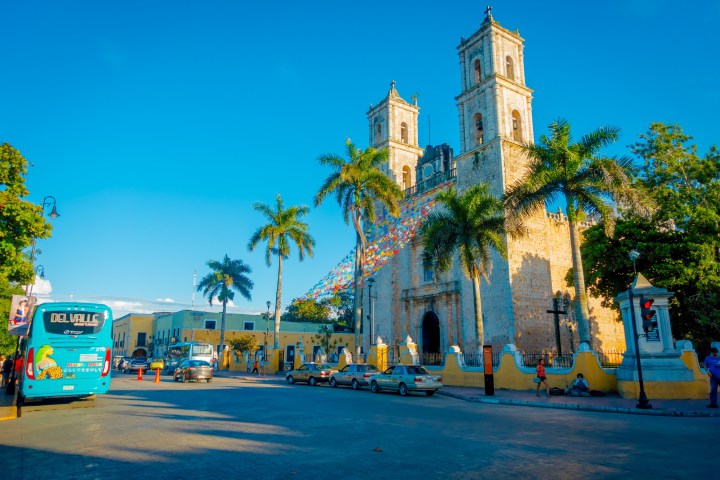 a group of people standing in front of a building